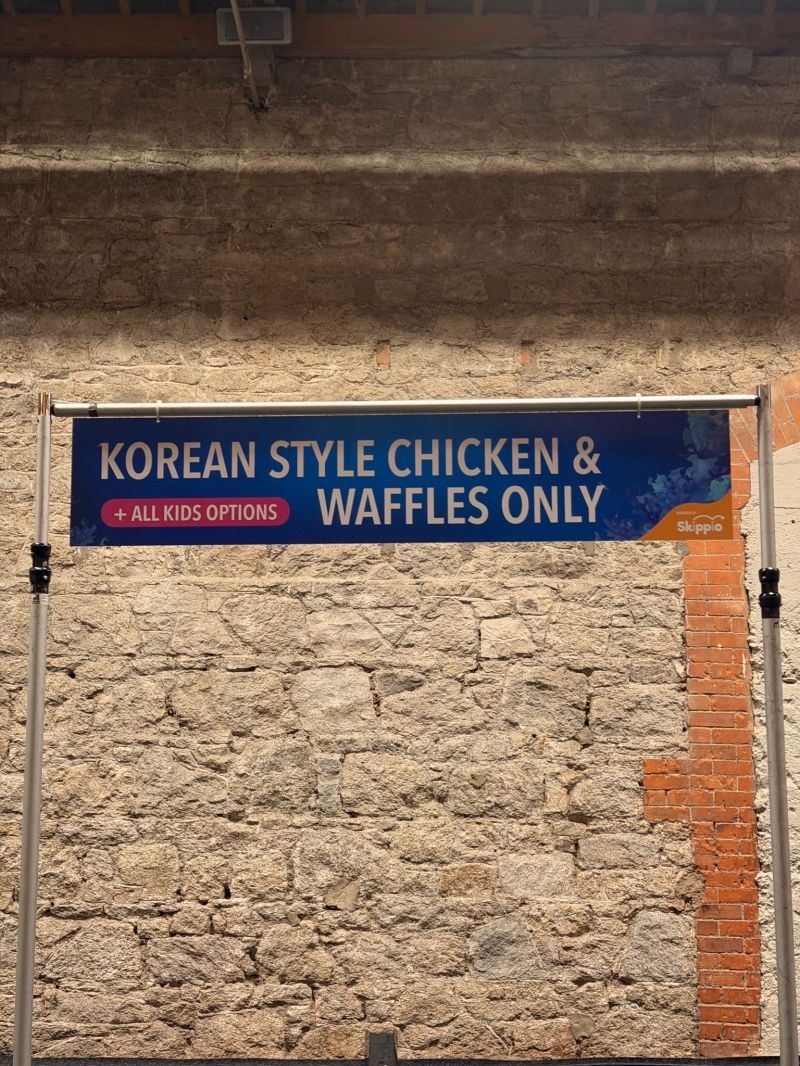 Skippio-branded food stall banner at an event